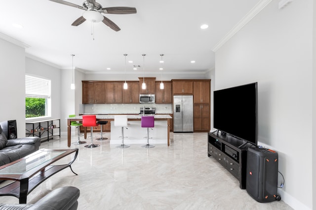 living room featuring crown molding and ceiling fan