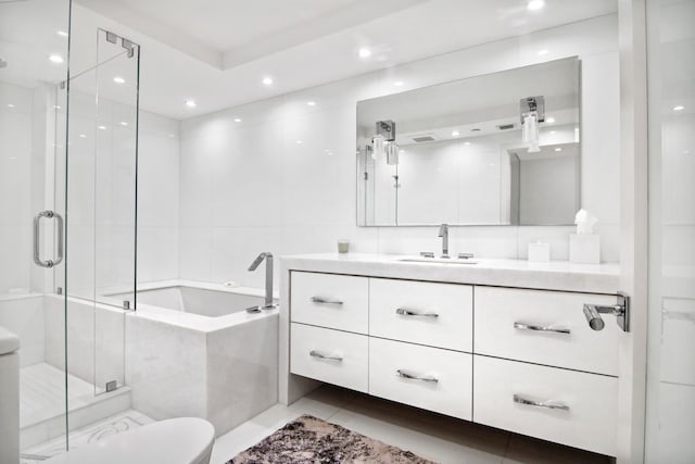 full bathroom with vanity, toilet, independent shower and bath, and tile patterned floors