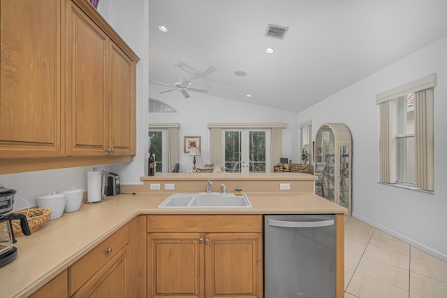 kitchen featuring dishwasher, kitchen peninsula, sink, ceiling fan, and lofted ceiling