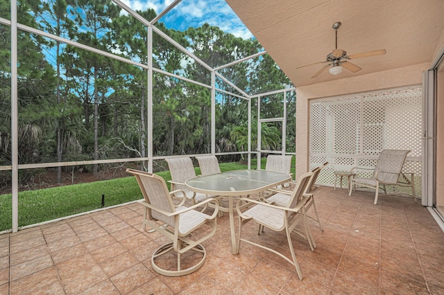 sunroom / solarium with ceiling fan