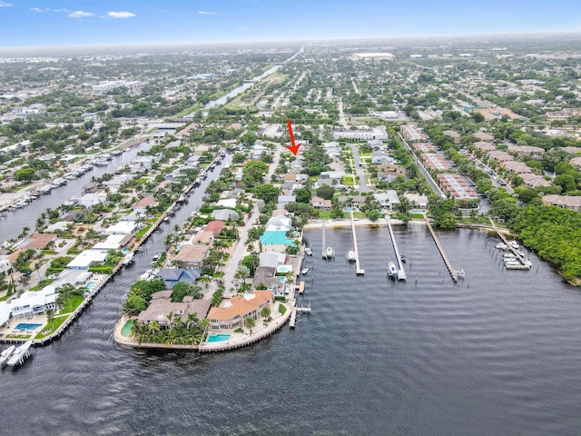 birds eye view of property featuring a water view