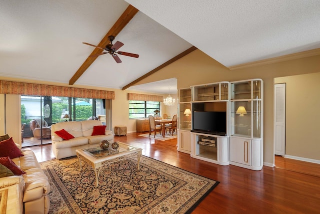 living room featuring ceiling fan with notable chandelier, a textured ceiling, wood-type flooring, and vaulted ceiling with beams