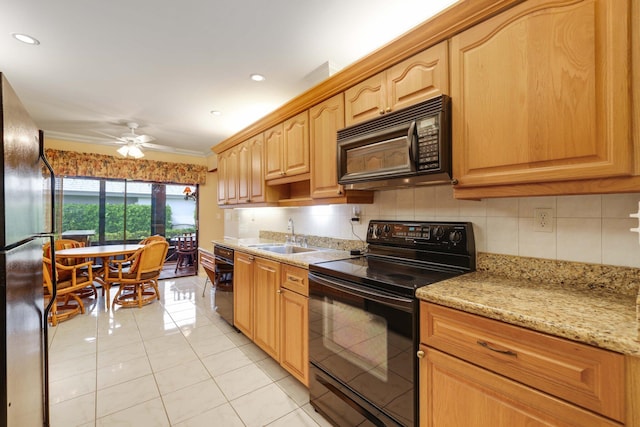 kitchen with black appliances, light tile patterned floors, crown molding, sink, and ceiling fan