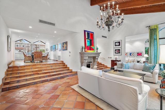 tiled living room featuring a notable chandelier, a premium fireplace, beamed ceiling, and high vaulted ceiling