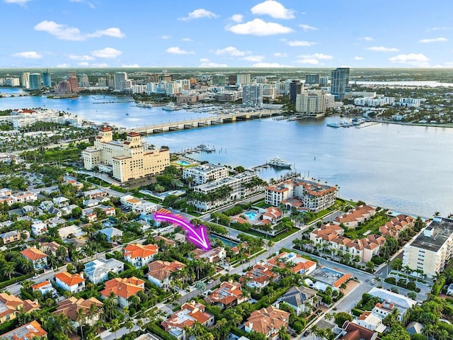 birds eye view of property featuring a water view