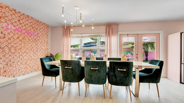 2600 NE 30th St, Fort Lauderdale, FL 33306 - dining area featuring french doors and wood finished floors