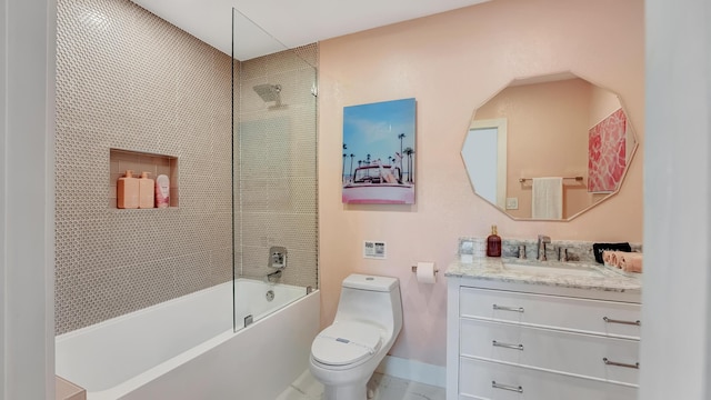 2600 NE 30th St, Fort Lauderdale, FL 33306 - bathroom with toilet, vanity, shower / bath combination, and baseboards