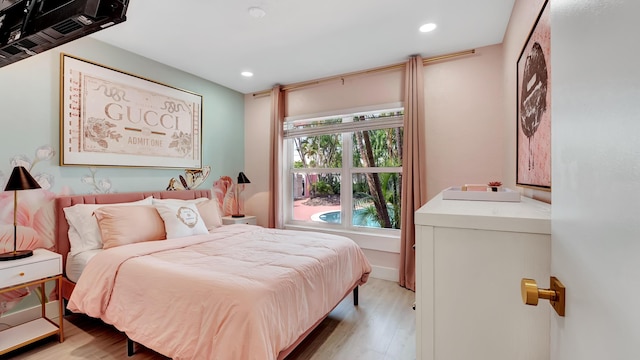 2600 NE 30th St, Fort Lauderdale, FL 33306 - bedroom with light wood-type flooring and recessed lighting