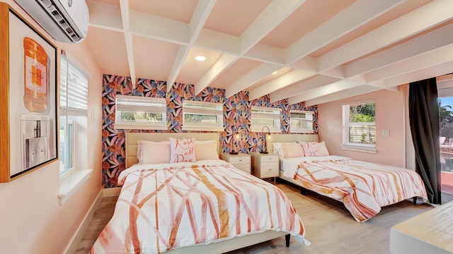 2600 NE 30th St, Fort Lauderdale, FL 33306 - bedroom featuring a wall mounted air conditioner, access to exterior, baseboards, and wood finished floors