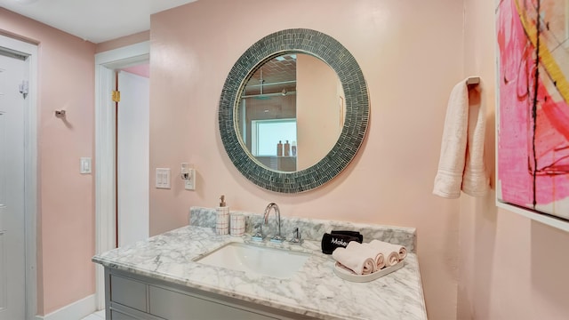 2600 NE 30th St, Fort Lauderdale, FL 33306 - bathroom with vanity and baseboards