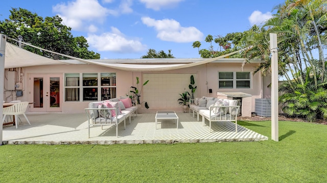 2600 NE 30th St, Fort Lauderdale, FL 33306 - rear view of property featuring outdoor lounge area, central air condition unit, a yard, a patio area, and french doors