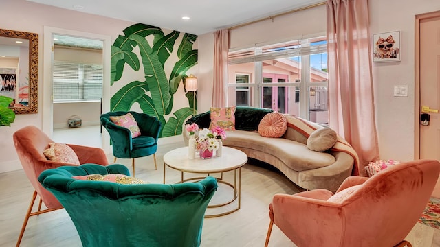 2600 NE 30th St, Fort Lauderdale, FL 33306 - living room featuring wood finished floors, recessed lighting, baseboards, and a wealth of natural light