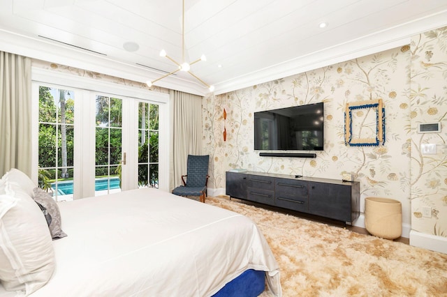 bedroom featuring lofted ceiling, crown molding, and access to exterior