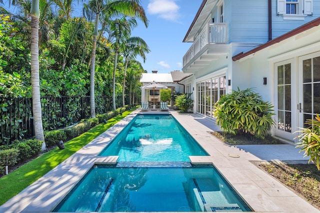 view of pool featuring a patio