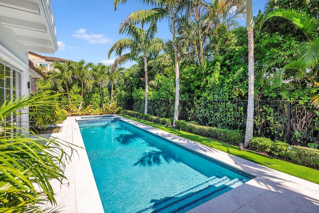 view of pool featuring a patio