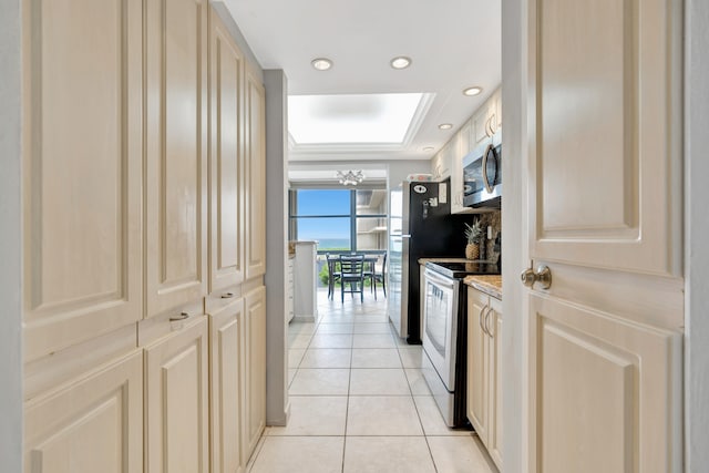 dining area with light tile patterned flooring