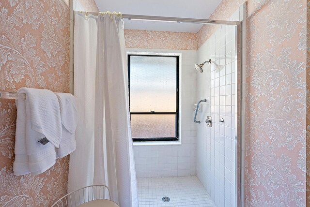 bathroom featuring curtained shower