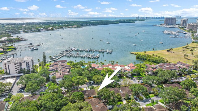 birds eye view of property featuring a water view