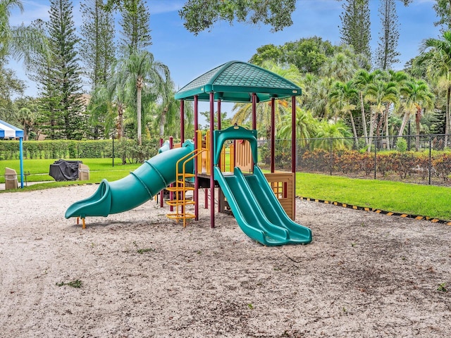 view of playground with a yard