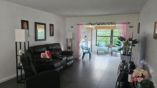 living room featuring washer / dryer and a textured ceiling