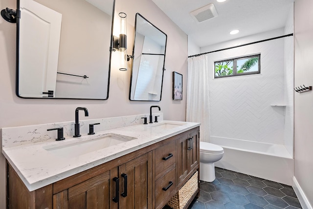 full bathroom with vanity, toilet, shower / bath combo, and tile patterned flooring