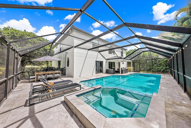 view of pool with an in ground hot tub, a patio, central AC unit, and a lanai