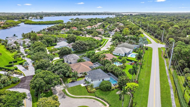 birds eye view of property featuring a water view