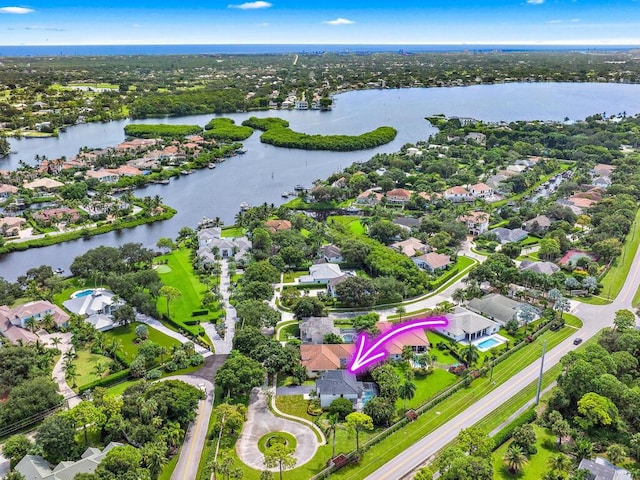 bird's eye view with a water view