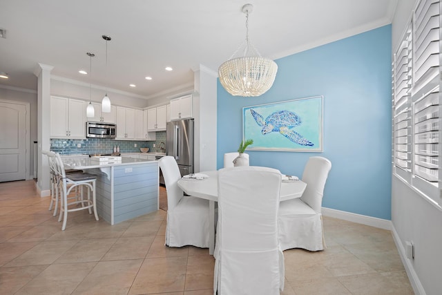 dining area featuring baseboards and ornamental molding