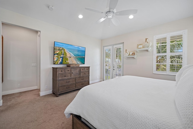 carpeted bedroom featuring ceiling fan and access to exterior