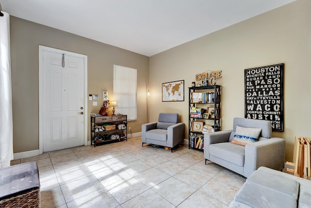 sitting room featuring light tile patterned floors