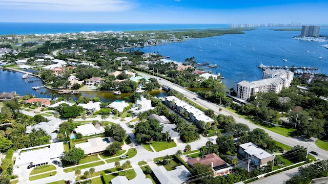 birds eye view of property featuring a water view