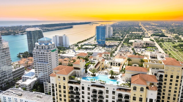 aerial view at dusk with a water view