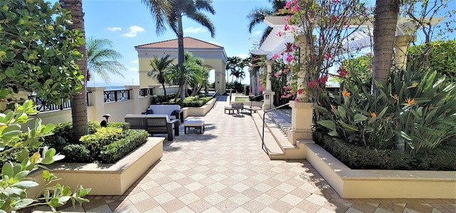 701 S Olive Ave Unit 202, West Palm Beach, FL 33401 - surrounding community with an outdoor hangout area