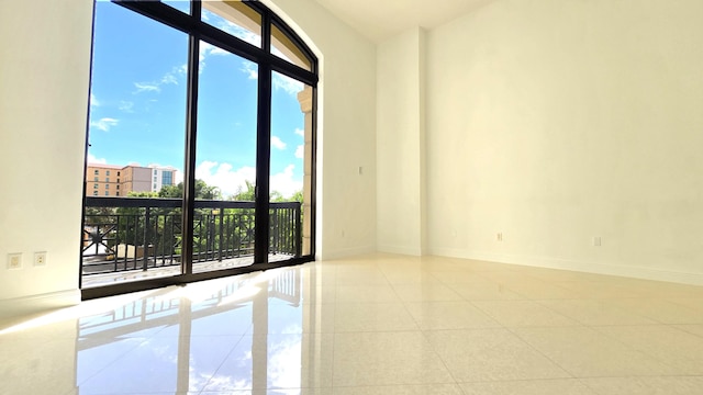 view of tiled spare room