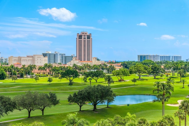 220 SE Mizner Blvd Unit 523, Boca Raton, FL 33432 - view of community with a water view, view of golf course, and a lawn
