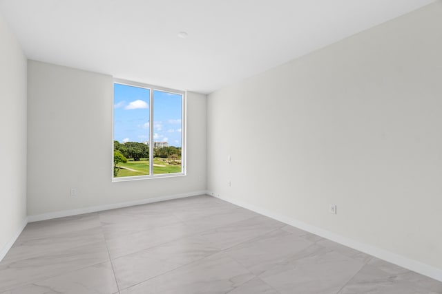 220 SE Mizner Blvd Unit 523, Boca Raton, FL 33432 - empty room featuring light marble finish floors and baseboards