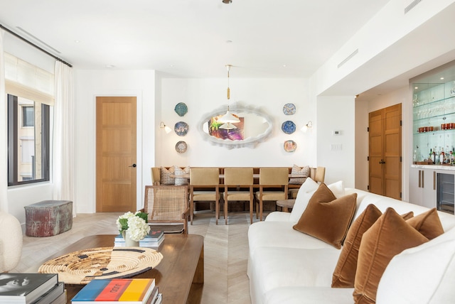 living room with bar and wine cooler