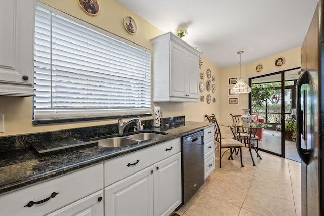 kitchen featuring decorative light fixtures, black appliances, light tile patterned floors, sink, and white cabinets