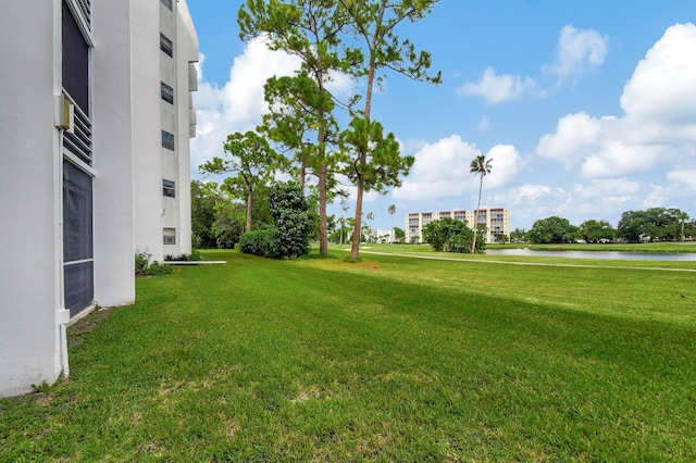 view of yard with a water view