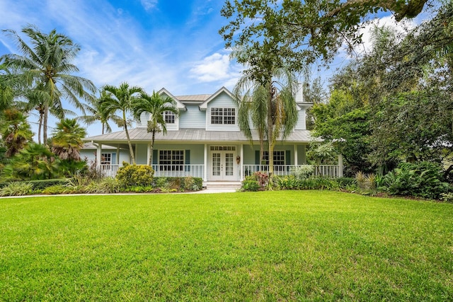 view of front of house featuring a front yard and a porch