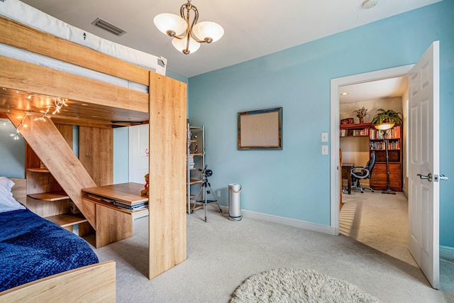 bedroom with light carpet and an inviting chandelier