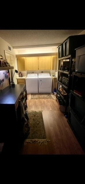 interior space featuring separate washer and dryer and visible vents