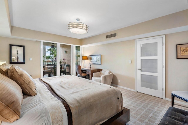 bedroom with light colored carpet and access to exterior