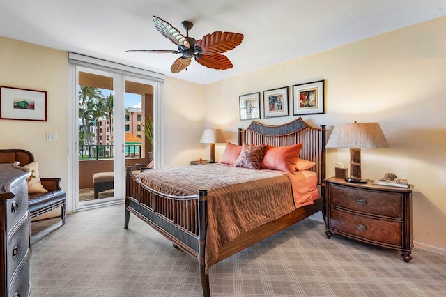 bedroom with access to outside, ceiling fan, and carpet flooring