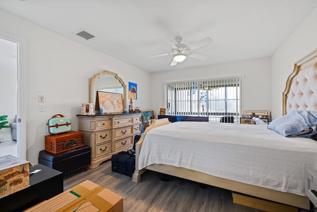 bedroom featuring ceiling fan and dark hardwood / wood-style flooring