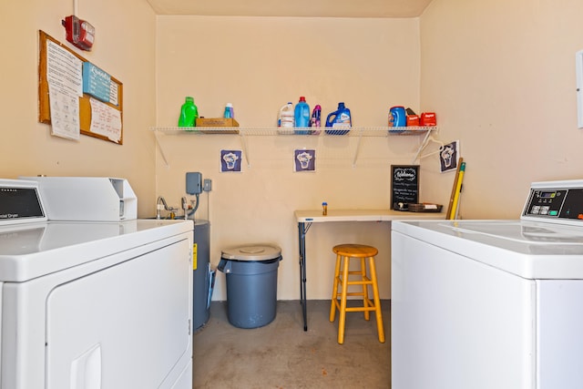 washroom with washer and dryer