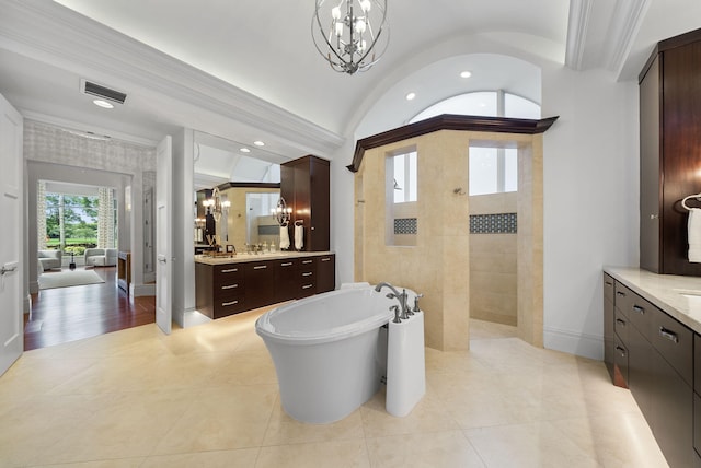 bathroom with lofted ceiling, independent shower and bath, crown molding, and vanity