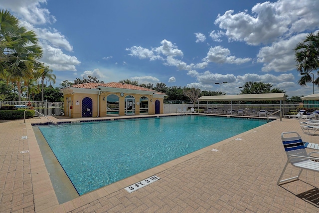 view of swimming pool featuring a patio