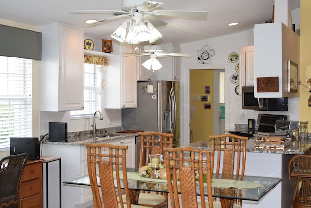 dining area featuring sink